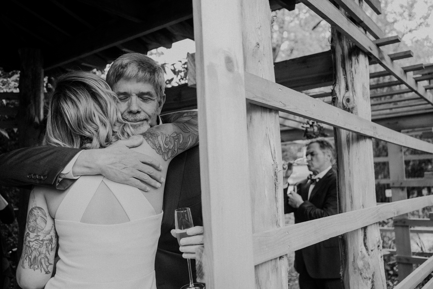 bride hugs her father during toasts dc wedding