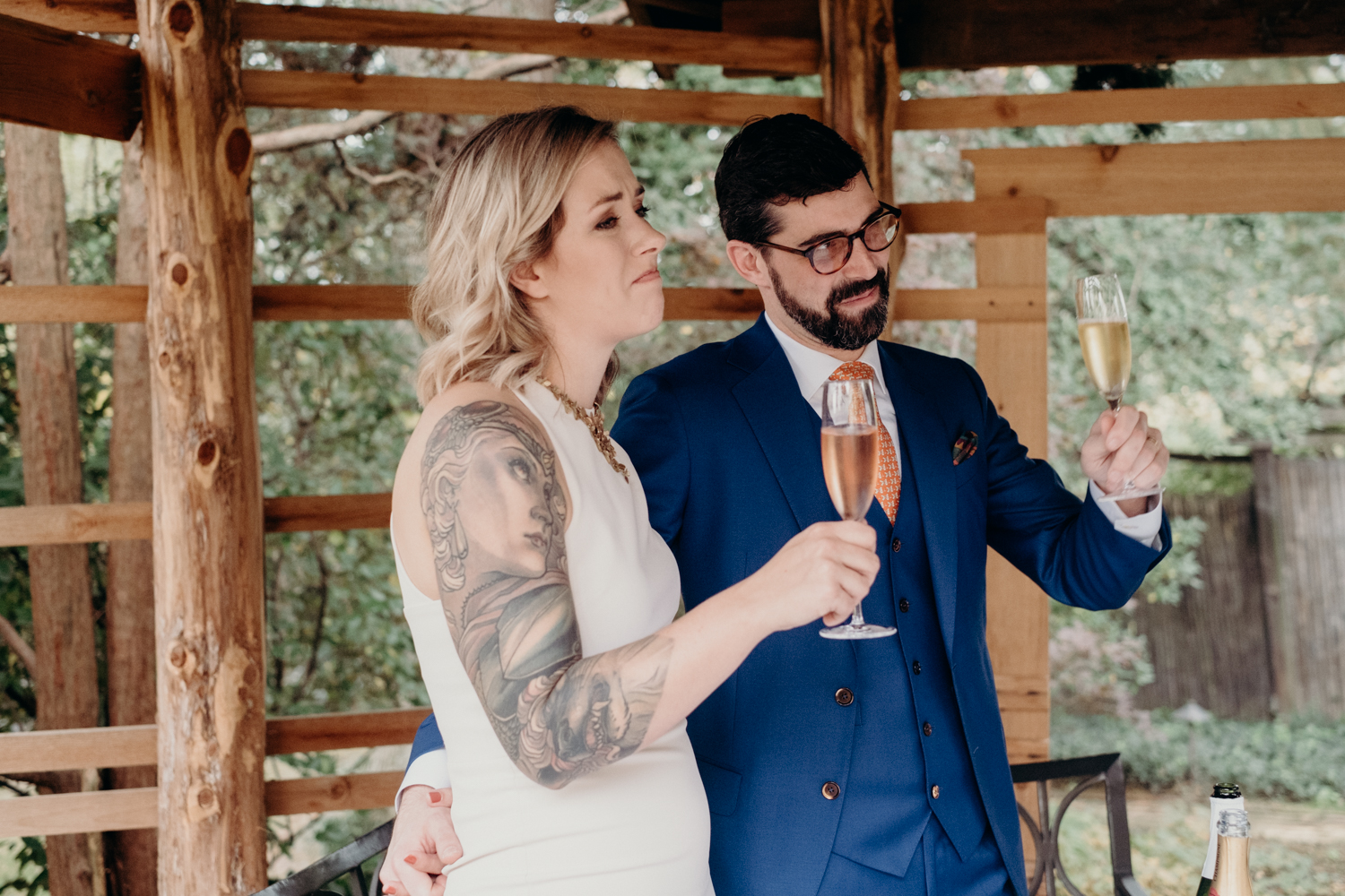 bride and groom toasts at tudor place gardens