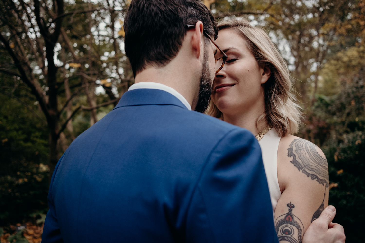 couple holds each other during wedding portraits at dc wedding