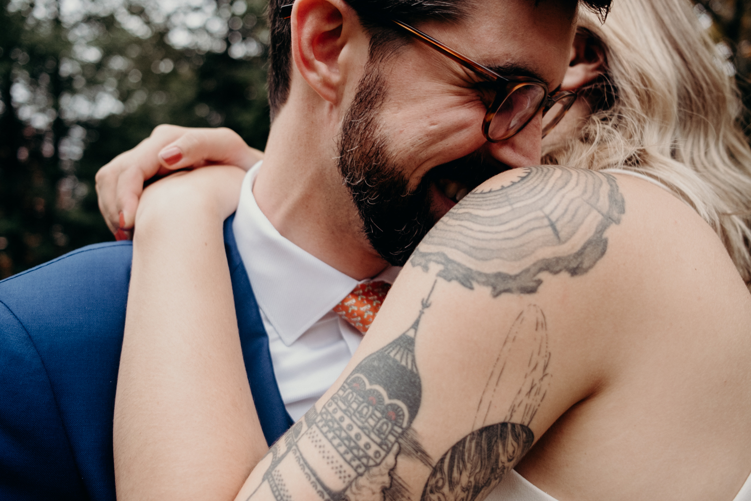 groom holds his bride at intimate wedding in washington dc