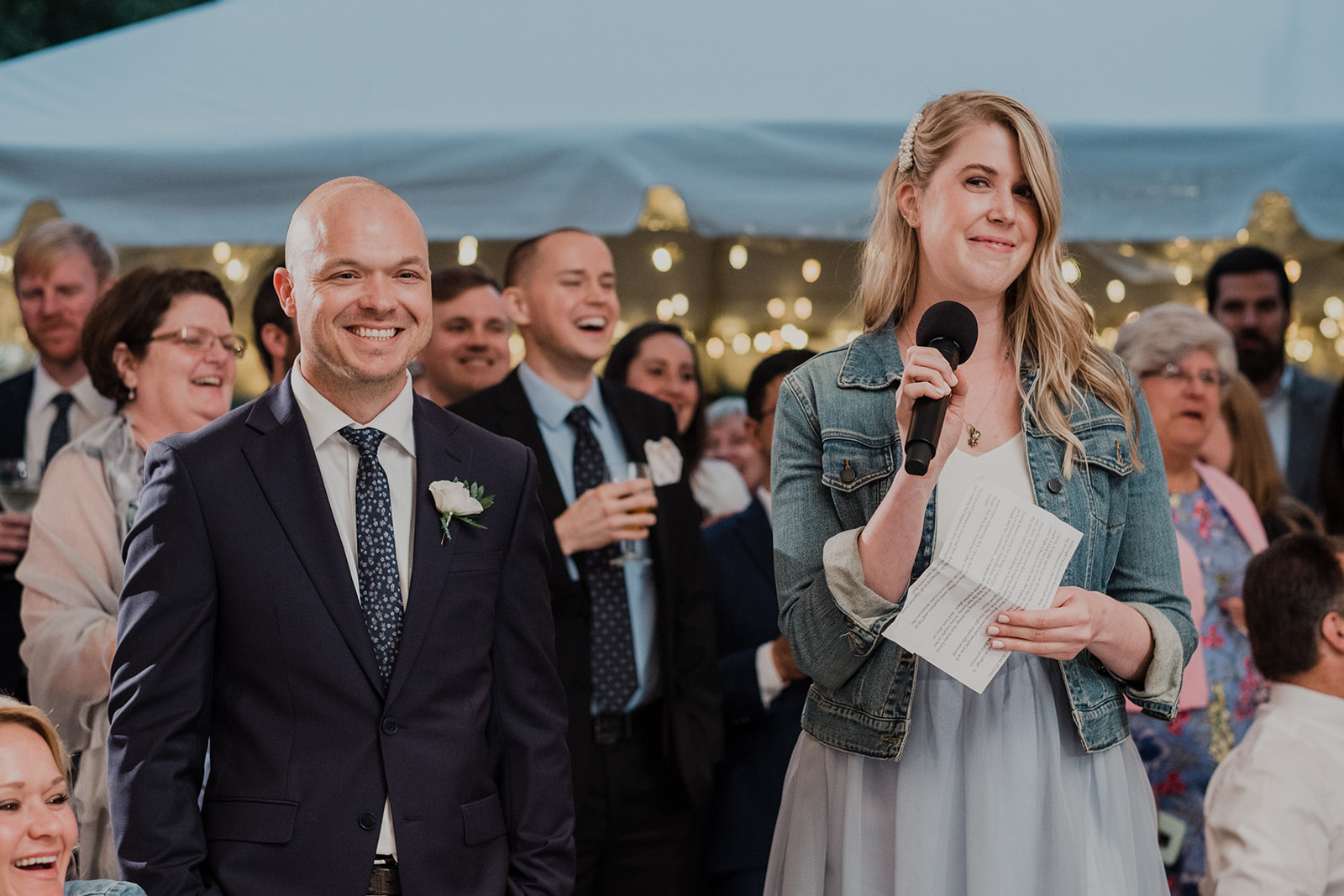 A best man and maid of honor give their toasts at a wedding reception at Blue Hill Farm in Waterford, VA. 