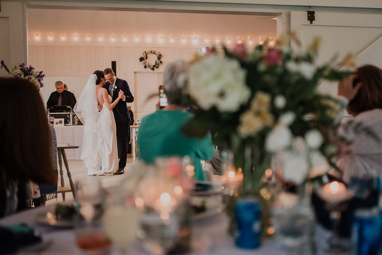 A bride and groom enjoy their first dance at their wedding reception at Blue Hill Farm in Waterford, VA. 