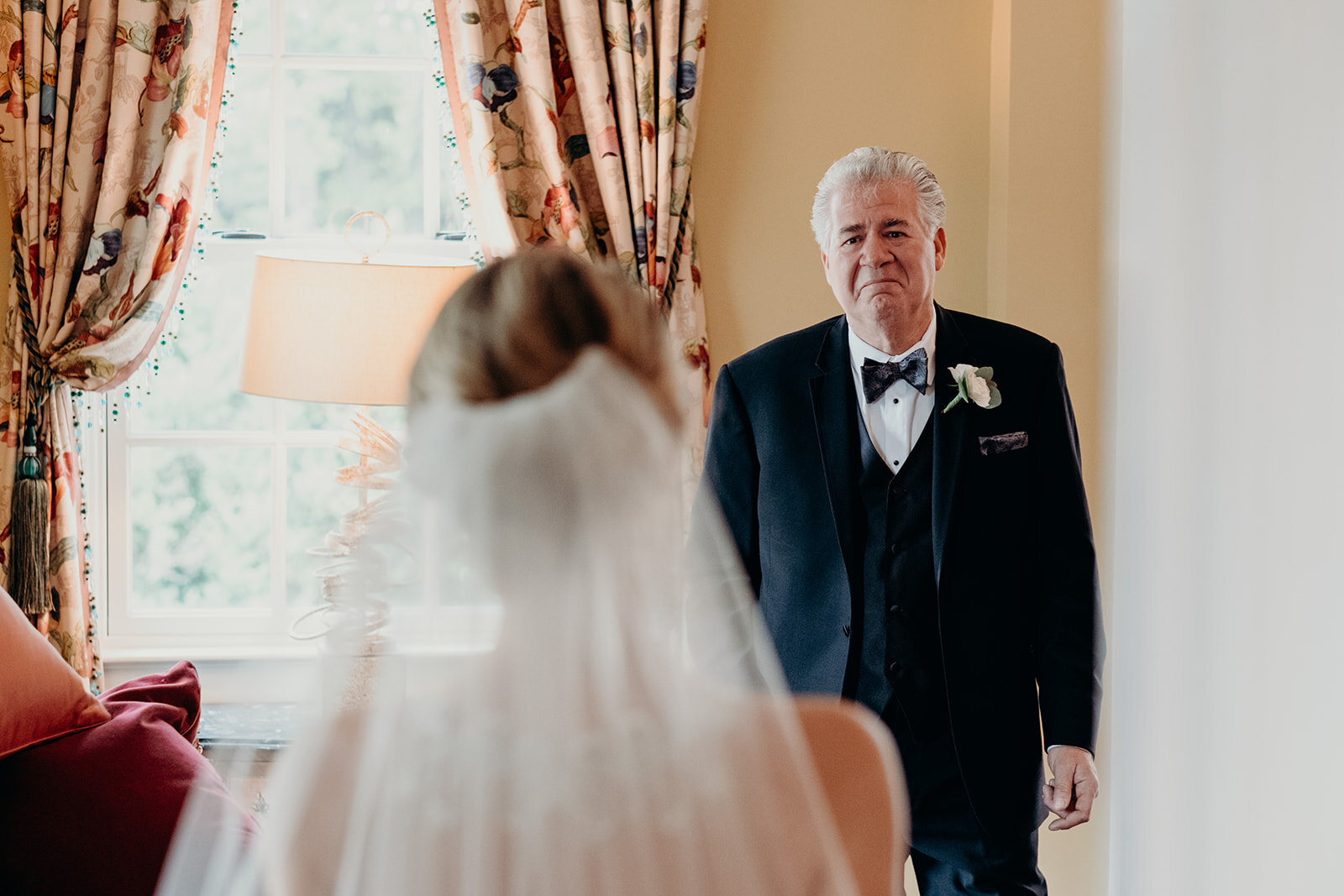 A father sees his daughter for the first time on her wedding day at the Retreat at Eastwood Farm in Warrenton, VA.